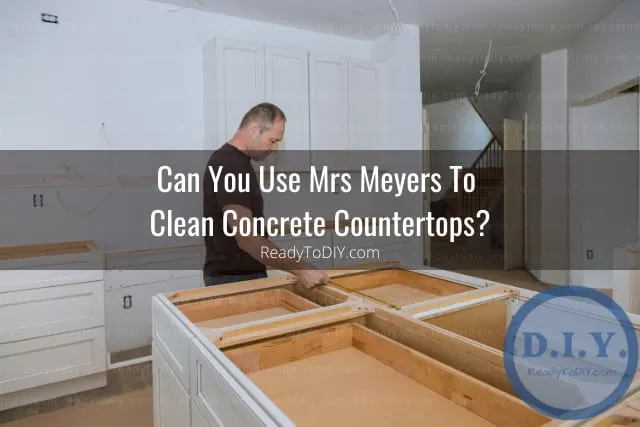 Man fixing the concrete countertops