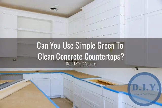 Man fixing the concrete countertops
