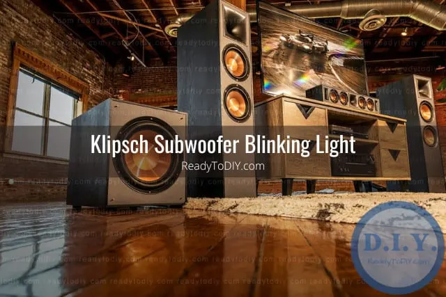 Black subwoofer on the floor