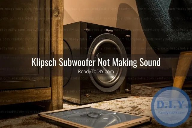 Black subwoofer on the floor