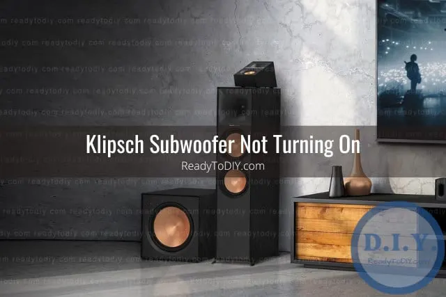 Black subwoofer on the floor