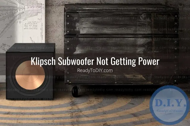 Black subwoofer on the floor