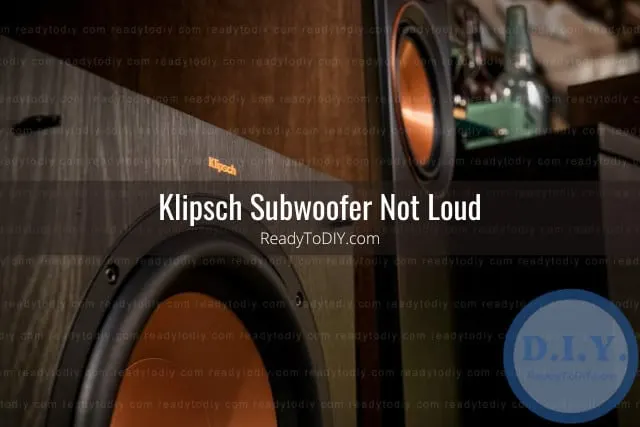 Black subwoofer on the floor