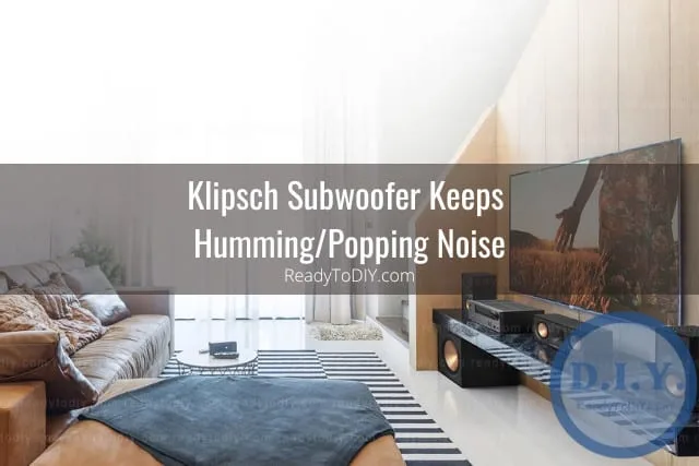 Black subwoofer on the floor