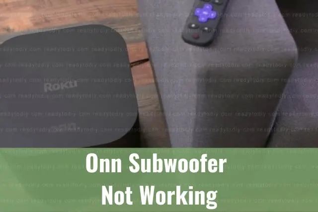 Black subwoofer on the floor