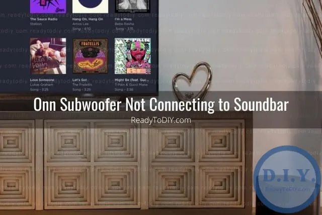 Black subwoofer on the floor
