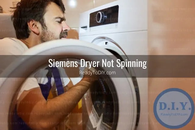 Man fixing the dryer