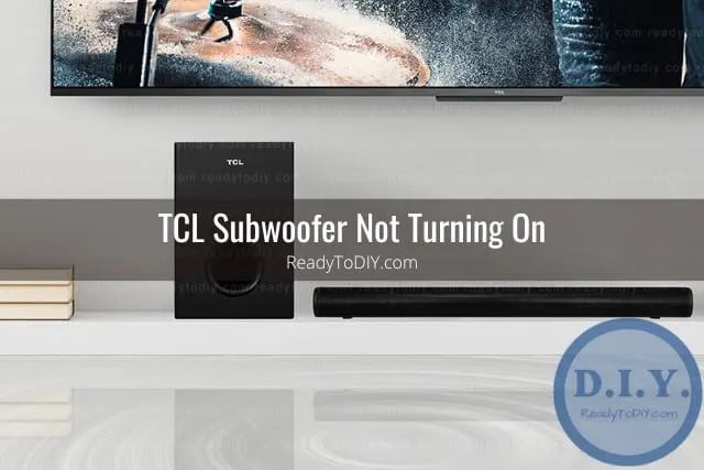 Black subwoofer on the floor