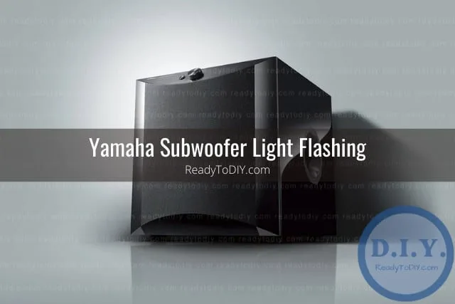 Black subwoofer on the floor