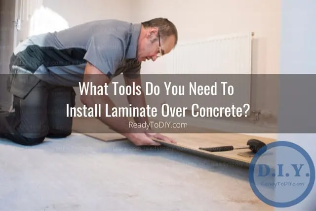 Handyman working on the laminate floor