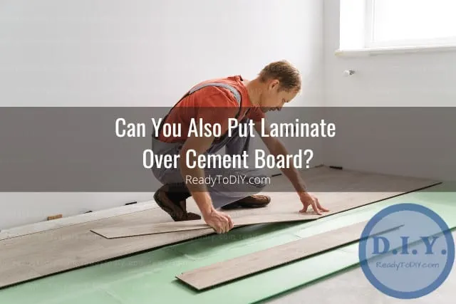 Handyman working on the laminate floor