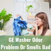 Woman holding clothes with bad smell