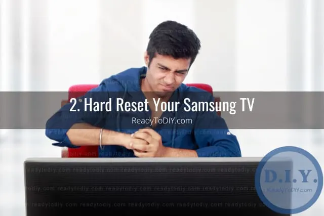 Frustrated man watching tv