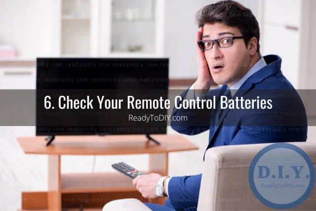 Confused man watching tv