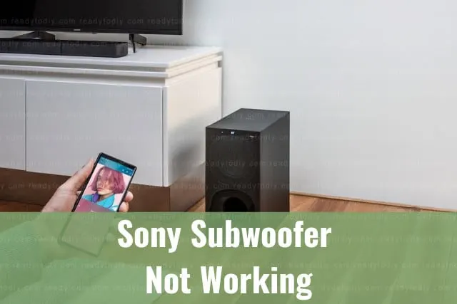 Black subwoofer on the floor