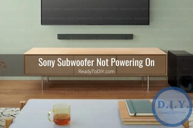 Black subwoofer on the floor