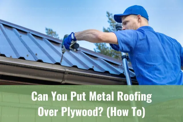 Man fixing the metal roofing