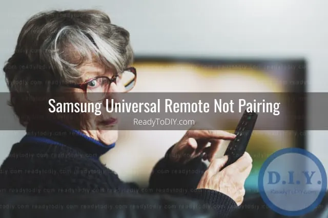 Holding a remote while point at the tv