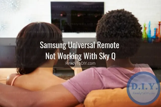 Holding a remote while point at the tv