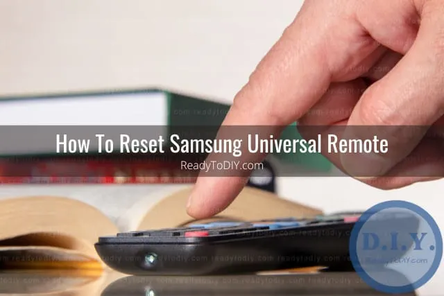 Holding a remote while point at the tv