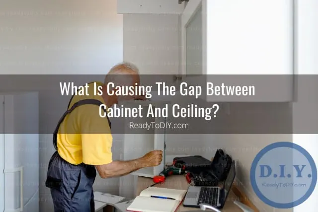 Man fixing the cabinet