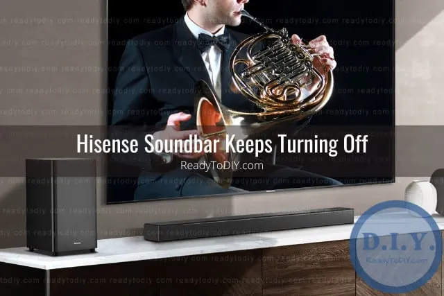 Black soundbar below the flatscreen tv