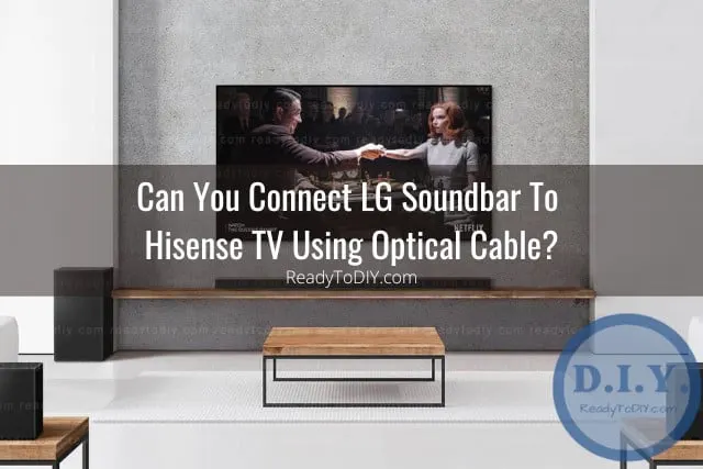 Black soundbar below the flatscreen tv