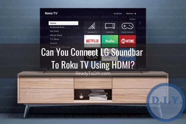 Black soundbar below the flatscreen tv