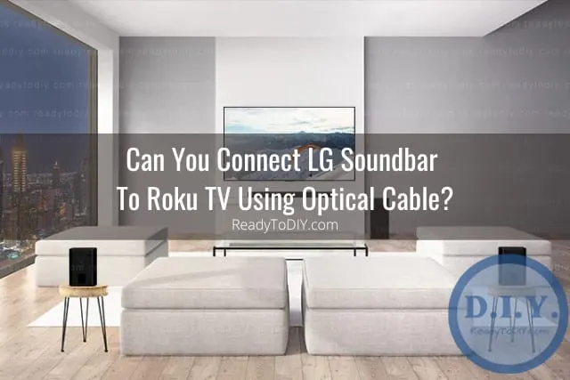 Black soundbar below the flatscreen tv