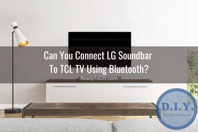 Black soundbar below the flatscreen tv