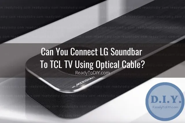 Black soundbar below the flatscreen tv