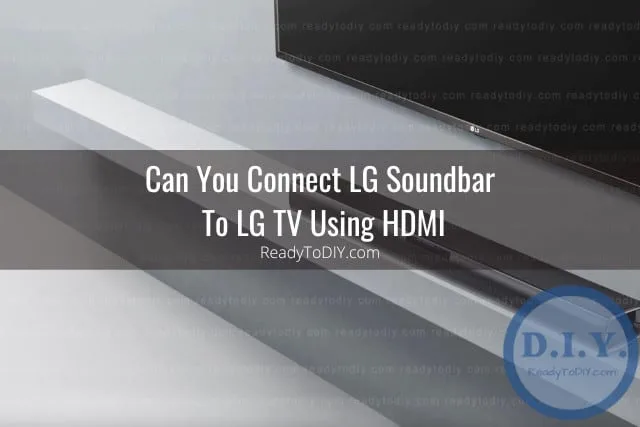 Black soundbar below the flatscreen tv