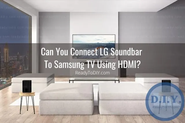 Black soundbar below the flatscreen tv