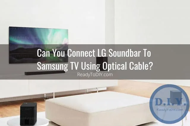 Black soundbar below the flatscreen tv
