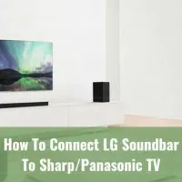 Black soundbar below the flatscreen tv