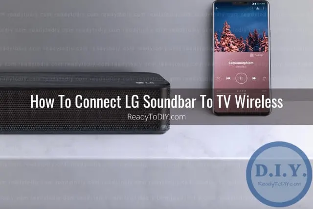 Flat screen tv in the living room with Soundbar Below
