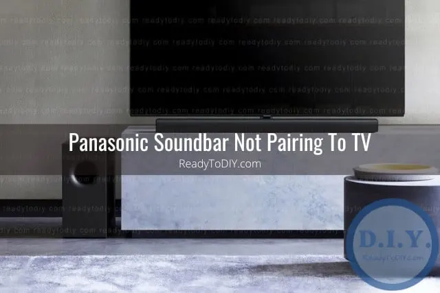 Flatscreen the with soundbar below