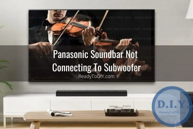 Flatscreen the with soundbar below