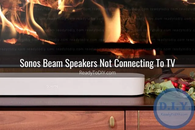 White latest speaker below flatscreen tv