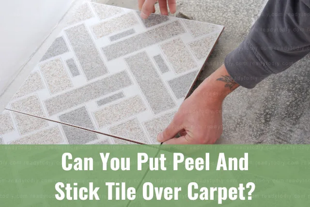 Man installing tiles