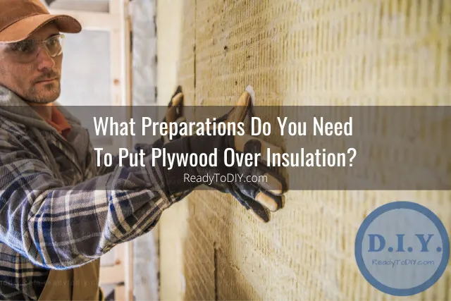 Man installing plywood