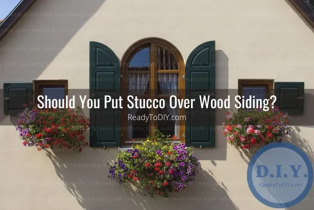 Stucco house with black window panes