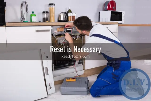 Man fixing the dishwasher