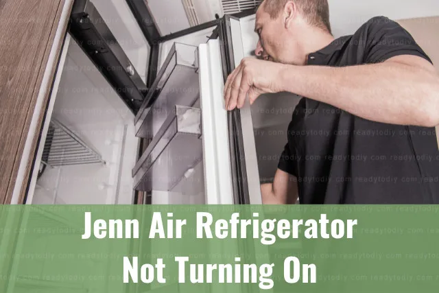 Man fixing the refrigerator