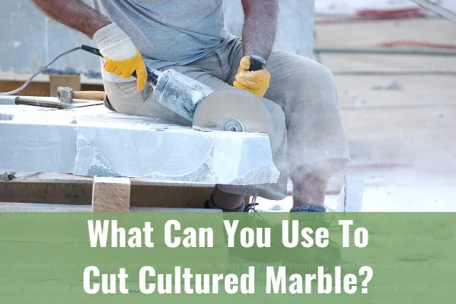 Man cutting marble
