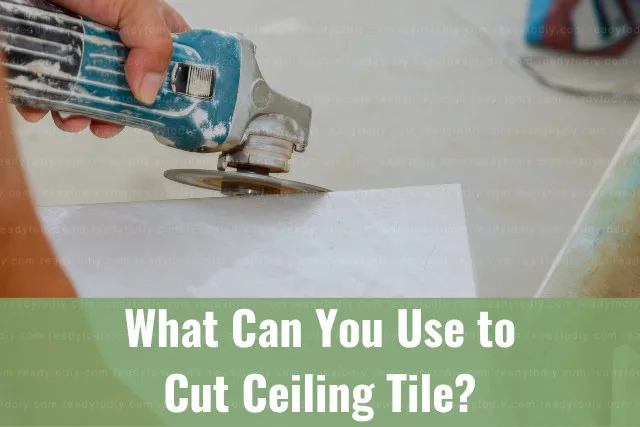 Man cutting tile