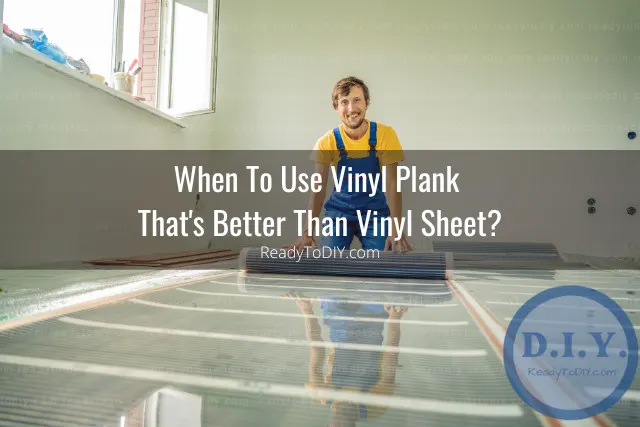 Man putting vinyl sheets on the floor