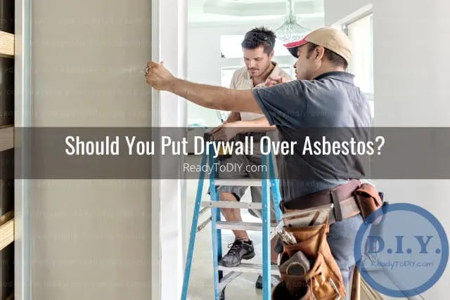 Man installing drywall