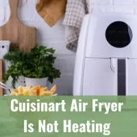 Modern air fryer in the kitchen with food inside