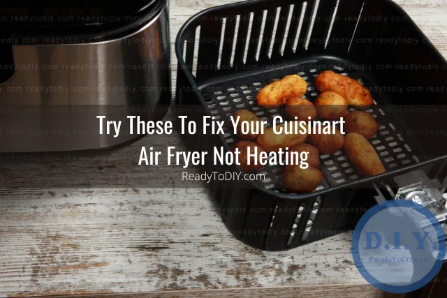 Modern air fryer in the kitchen with food inside